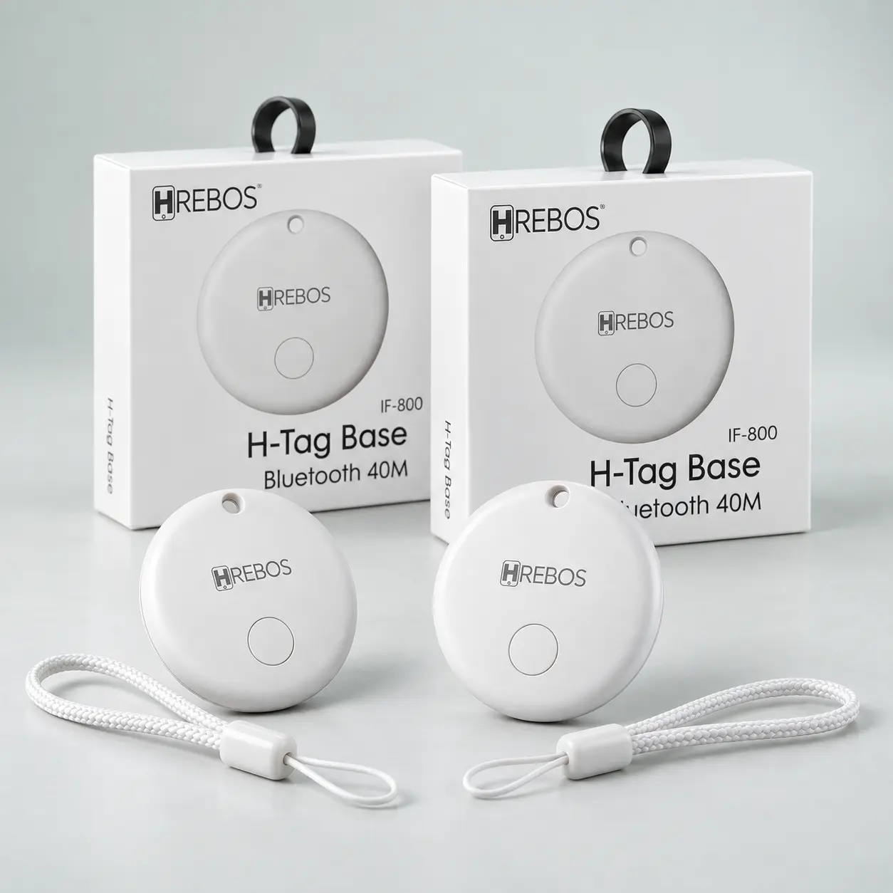 Duas unidades da Tag Localizador Smart com suas embalagens e cordões